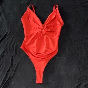 Orange body sculpting body suit